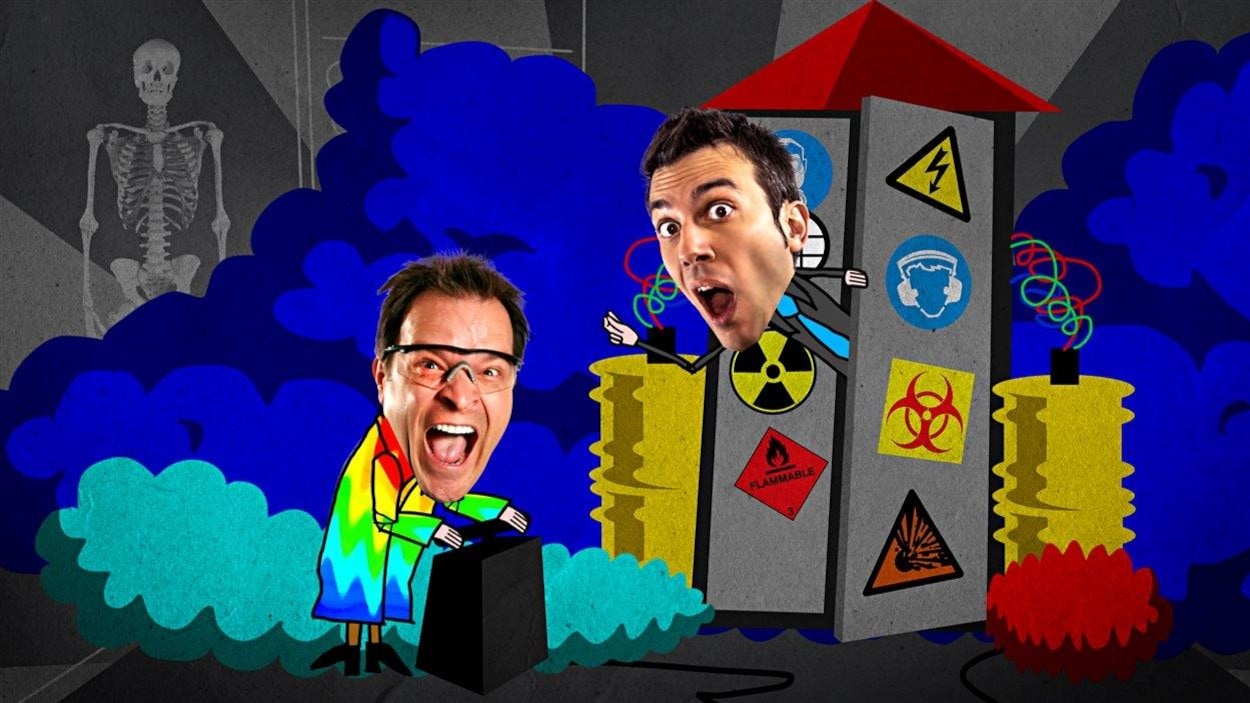 Dans un décor de dessins animés, Yannick Bergeron déclenche une bombe et Daniel Coutu sort la tête d'une machine. Les deux crient.