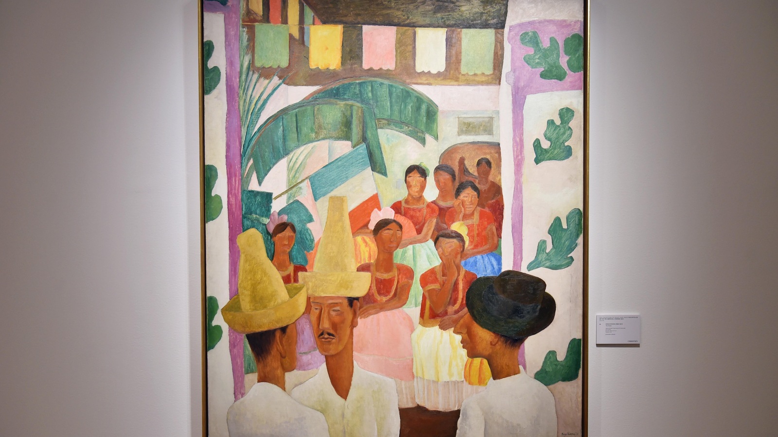Le tableau <i>Los Rivales</i> de Diego Rivera où, en bas à gauche, deux hommes avec chapeau se font face lors d'une célébration traditionnelle mexicaine. Le tableau <i>Los Rivales</i> de Diego Rivera où, en bas à gauche, deux hommes avec chapeau se font face lors d'une célébration traditionnelle mexicaine.