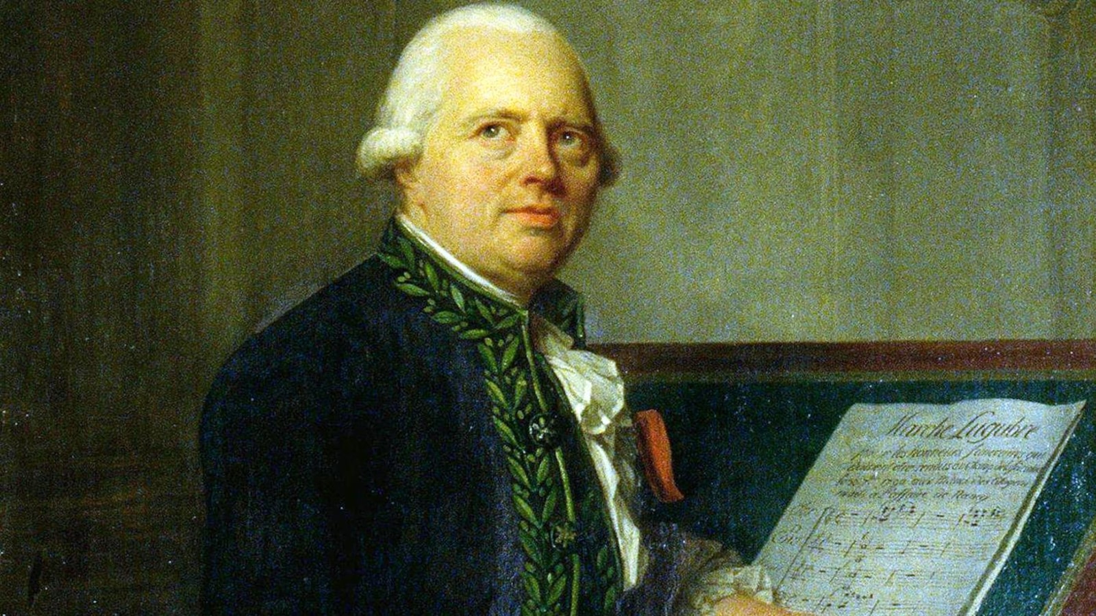 Portrait d'un homme qui tient une plume dans sa main droite devant un pupitre contenant des partitions. Portrait d'un homme qui tient une plume dans sa main droite devant un pupitre contenant des partitions.