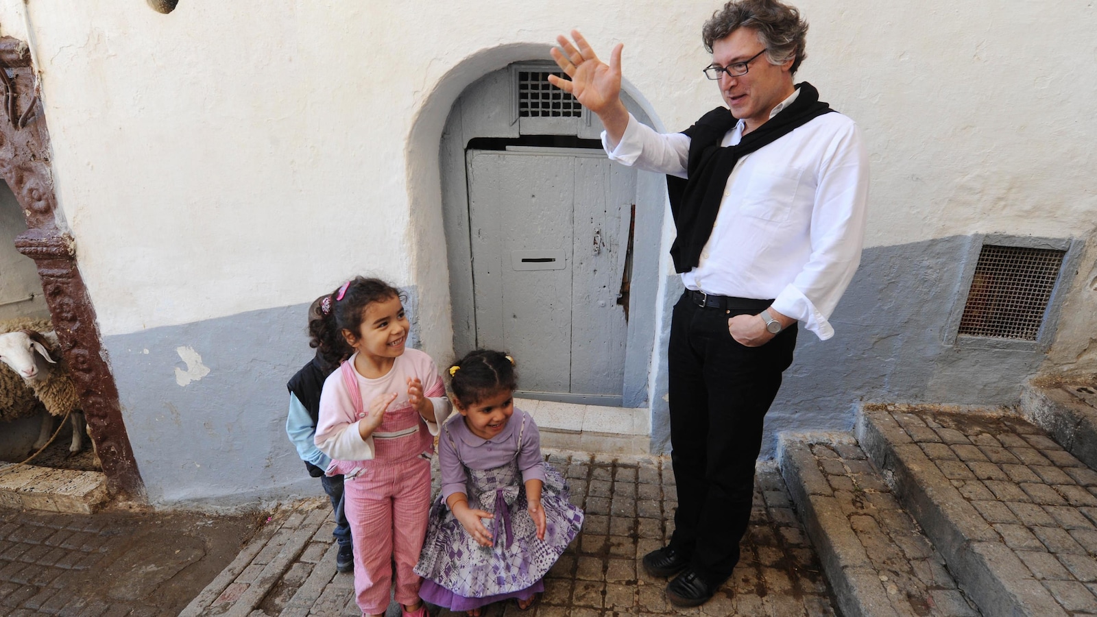 French philosopher Michel Onfray (R) speaks to children in the Casbah of Algiers on November 2, 2011. AFP PHOTO / FAROUK BATICHE (Photo credit should read FAROUK BATICHE/AFP/Getty Images) French philosopher Michel Onfray (R) speaks to children in the Casbah of Algiers on November 2, 2011. AFP PHOTO / FAROUK BATICHE (Photo credit should read FAROUK BATICHE/AFP/Getty Images)