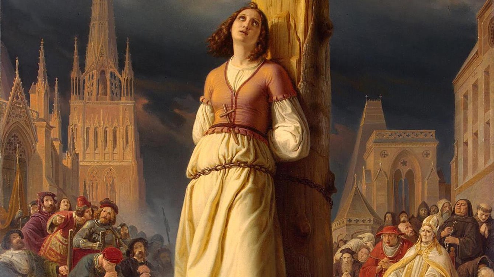 Tableau représentant une femme attachée sur un bûcher et entourée de gens qui la regardent. Tableau représentant une femme attachée sur un bûcher et entourée de gens qui la regardent.