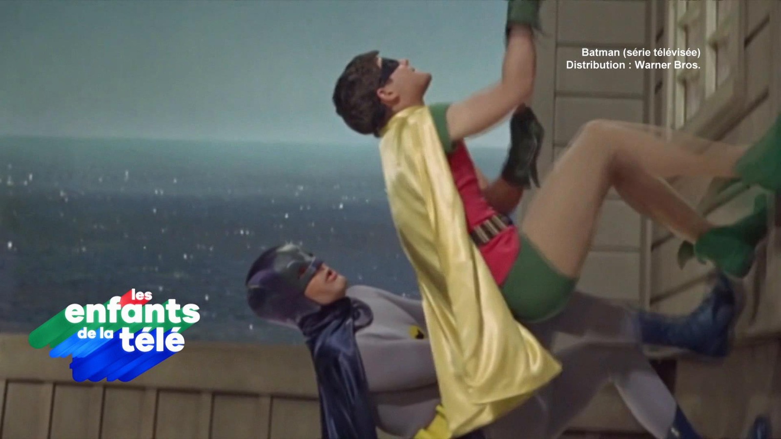 batman et Robin qui grimpent. batman et Robin qui grimpent.