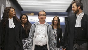 Michel Cadotte, entouré de ses avocats, au palais de justice de Montréal.