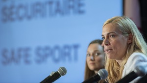 Minister of Sport Pascale St-Onge, right, with Olympic athlete Rosie MacLennan, speaks during a news conference in Montreal, Sunday, June 12, 2022. THE CANADIAN PRESS/Graham Hughes