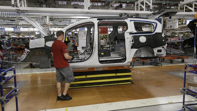 Steve Vince works on a 2017 Chrysler Pacifica on the assembly line at the Windsor Assembly Plant, Friday, May 6, 2016, in Windsor, Ontario. Fiat Chrysler Automobiles and Google announced Tuesday, May 3, that they will work together to more than double the size of Google's self-driving vehicle fleet by adding 100 Chrysler Pacifica minivans. (AP Photo/Carlos Osorio)