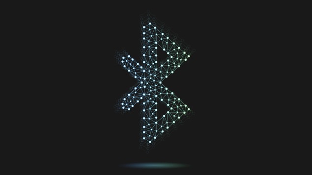Le logo de Bluetooth stylisé en plusieurs points de lumière reliés entre eux sur fond noir. Le logo de Bluetooth stylisé en plusieurs points de lumière reliés entre eux sur fond noir.