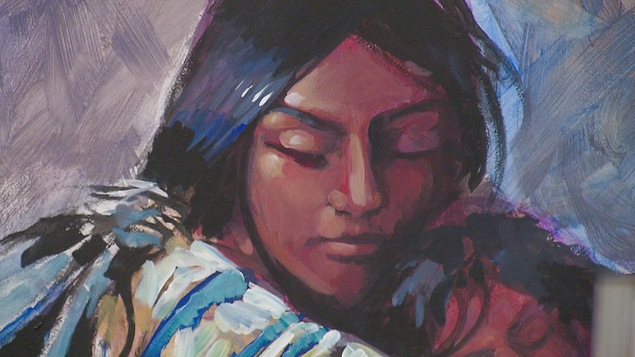 une peinture avec un visage de femme autochtone et son enfant dans les bras une peinture avec un visage de femme autochtone et son enfant dans les bras