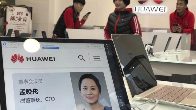 Dans une succursale de Huawei, le portrait de Meng Wanzhou apparaît sur un ordinateur portable.