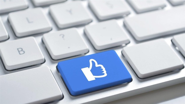 Un J'aime de Facebook sur une touche de clavier d'ordinateur