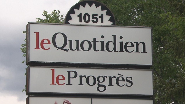 Pancarte indiquant Le Quotidien et Le Progrès.