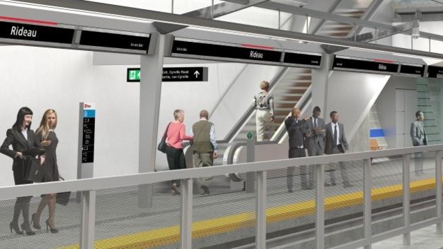 Vue sur un quai de station avec un escalier mécanique et deux trains. Vue sur un quai de station avec un escalier mécanique et deux trains.