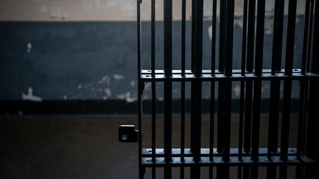 Les grilles d'une cellule de prison. Les grilles d'une cellule de prison.