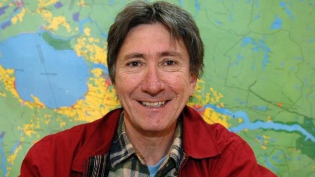 René Tremblay devant une carte du Saguenay-Lac-Saint-Jean René Tremblay devant une carte du Saguenay-Lac-Saint-Jean