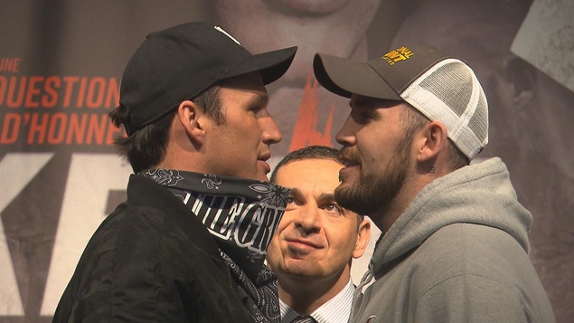 Le visage des deux boxeurs face à face