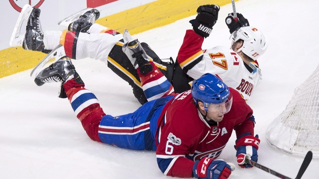 Lance Bouma des Flames et Shea Weber du Canadien se retrouvent tous deux sur la glace, lors d'un affrontement à Montréal en janvier Lance Bouma des Flames et Shea Weber du Canadien se retrouvent tous deux sur la glace, lors d'un affrontement à Montréal en janvier