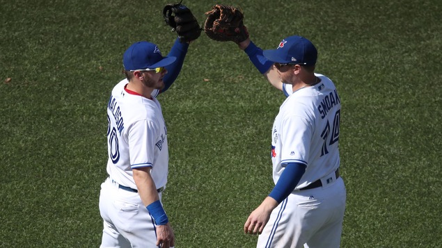 Josh Donaldson (no 20) et Justin Smoak (no 14) Josh Donaldson (no 20) et Justin Smoak (no 14)