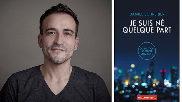 Il pose près de son livre « Je suis né quelque part ».