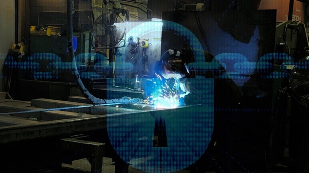 Un chaîne cybernitique sur une photo d'un atelier d'une PME