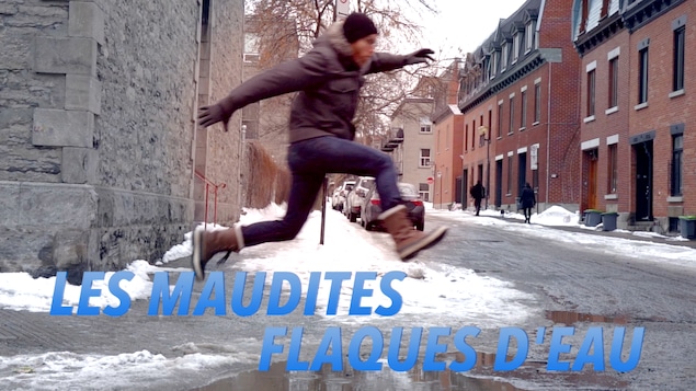 Marc-André Carignan en train de sauter par-dessus une flaque d'eau.