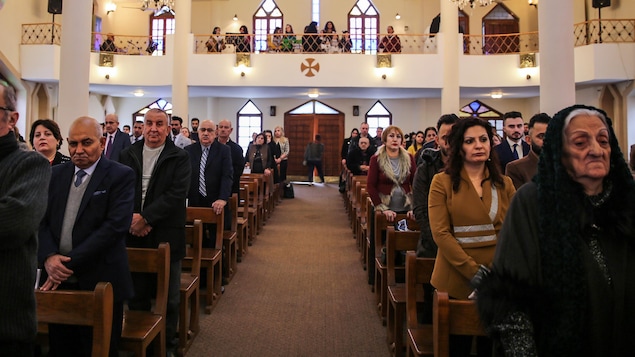 Des chrétiens participent à une messe de Noël dans une église de Bagdad, en Irak, le 25 décembre 2018.