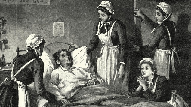 Des infirmières prodiguent des soins à un homme souffrant de tuberculose.
