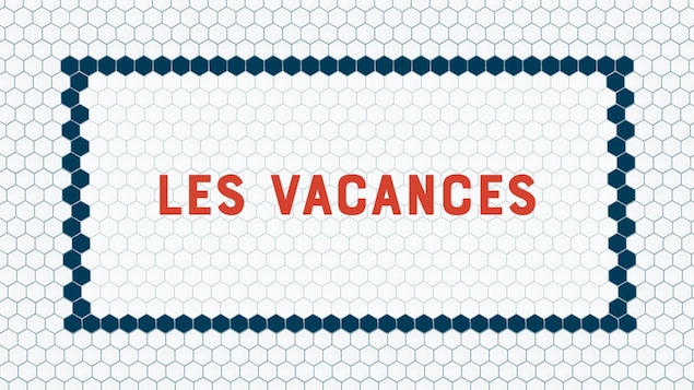 Les vacances écrit en rouge sur fond blanc.