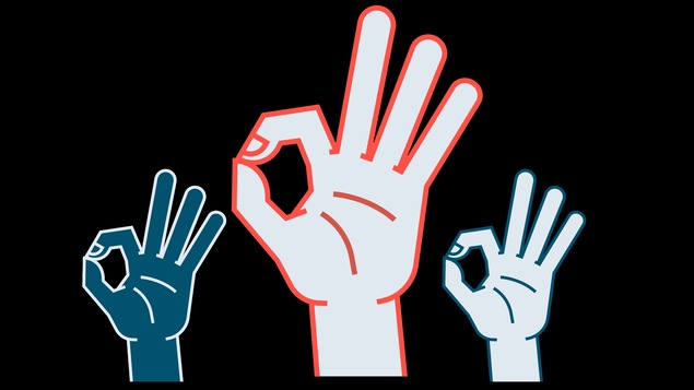Des mains font le signe O.K.