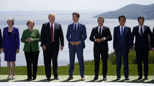 La première ministre britannique Theresa May, la chancelière allemande Angela Merkel, le président américain Donald Trump, le premier ministre canadien Justin Trudeau, le président français Emmanuel Macron, le premier ministre japonais Shinzo Abe et le premier ministre italien Giuseppe Conte.