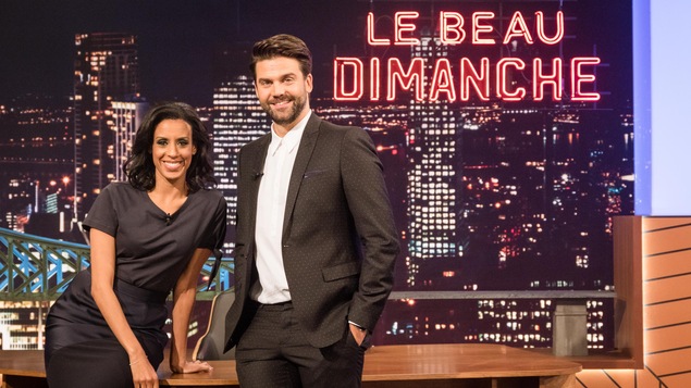 Rebecca Makonnen et Jean-Philippe Wauthier dans le studio de leur émission. En arrière-plan, le pont Jacques-Cartier et la ville de Montréal. Rebecca Makonnen et Jean-Philippe Wauthier dans le studio de leur émission. En arrière-plan, le pont Jacques-Cartier et la ville de Montréal.